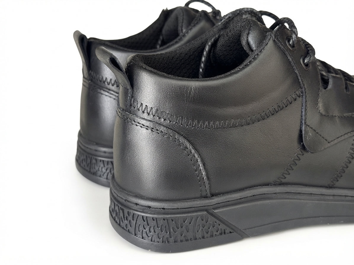 Glooglass™ – Bouttine en Cuir Noir
